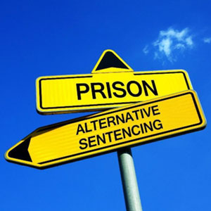  A road sign on which prison is written - The Law Office Of Michael D. Barber