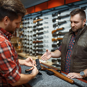 Here is the alt text of the image shared by the design team: Customer talking to a salesman in a gun shop, Florida gun laws.